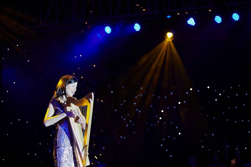 Katie playing the harp