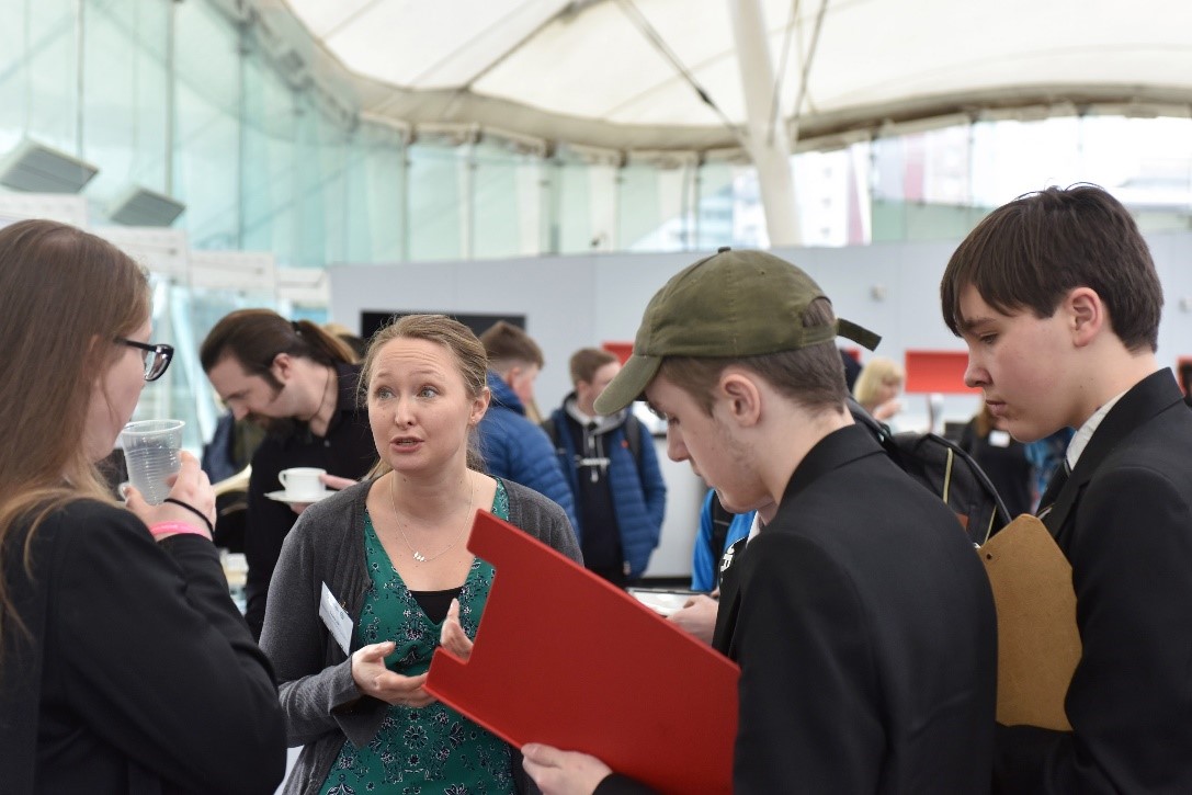 Employer talking to pupils